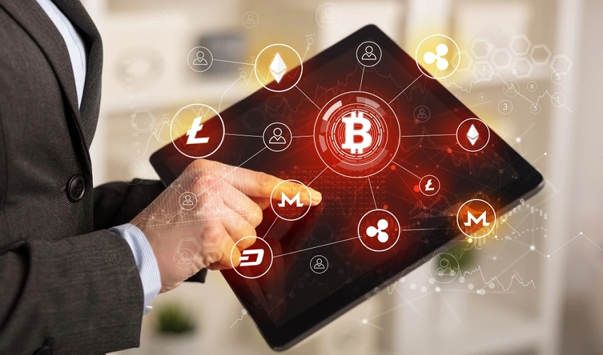 Business woman using tablet with cryptocurrency bitcoin
