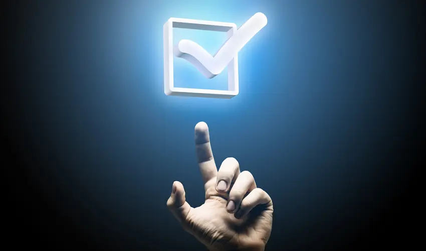 Hand pointing at a checkbox