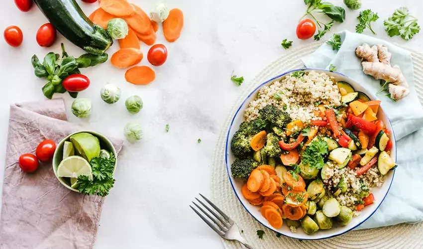 Healthy bowl with vegetables on table
