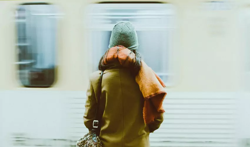 Woman waiting for train